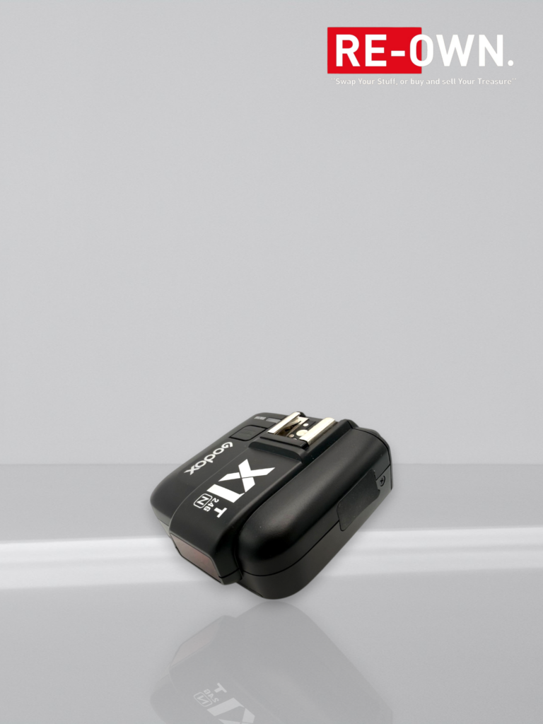 Godox Speedlite V100 Nikon + Godox X1T-N flash trigger